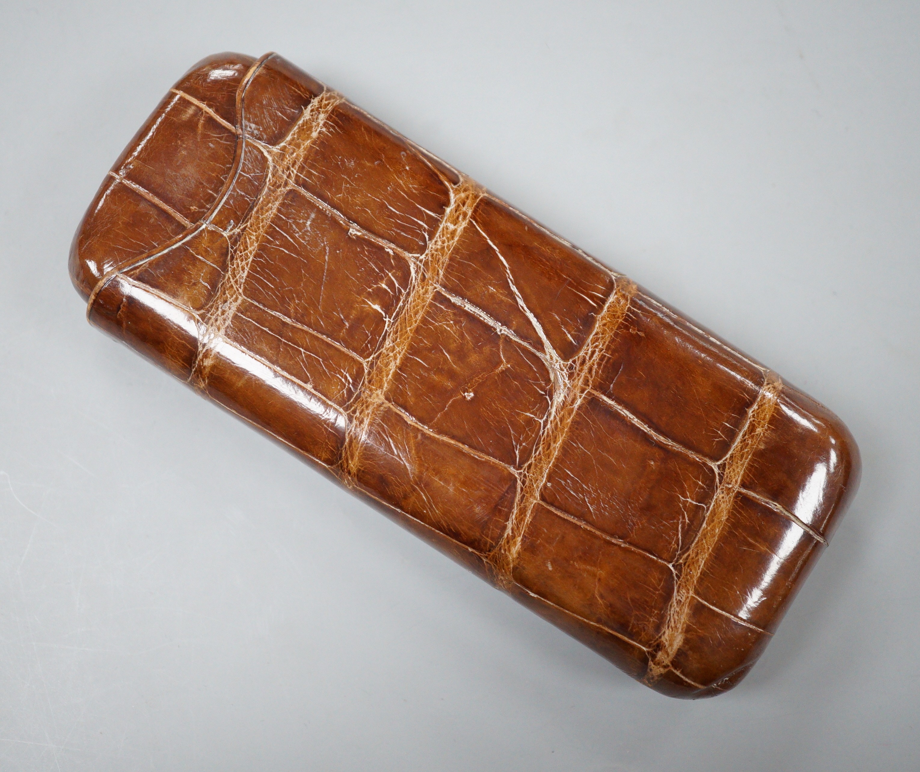 A crocodile cigar case by Drew & Sons Piccadilly Circus, pre-1940, 14.5cm long